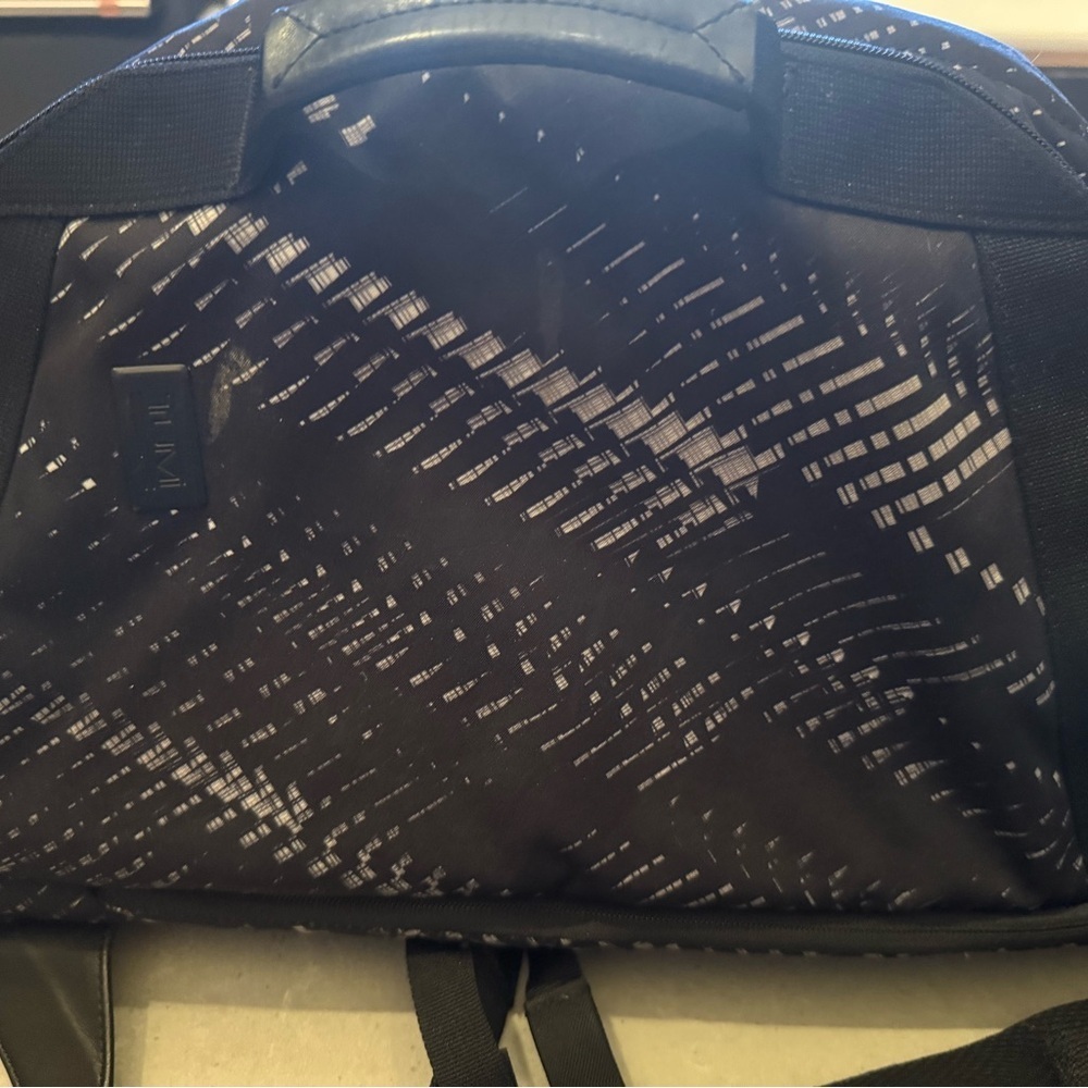 Tumi Black and Gray Patterned Duffel Backpack